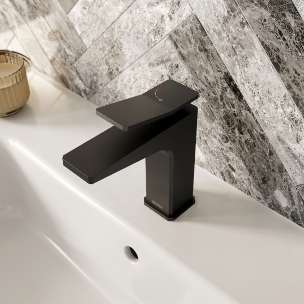 Lifestyle image of the Bristan Tangram Black Basin Mixer Tap & Click-Clack Waste mounted on a white basin